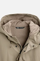 HOODED RUBBERIZED PARKA