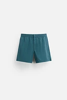 STRUCTURED REGULAR SWIM SHORTS