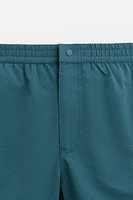 STRUCTURED REGULAR SWIM SHORTS