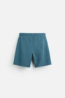 LONGLINE SWIMMING TRUNKS