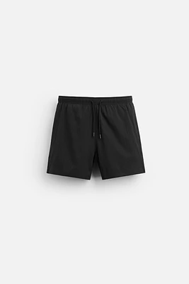 STRUCTURED REGULAR SWIM SHORTS