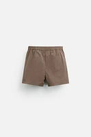 BUTTON SHORT SWIMMING TRUNKS