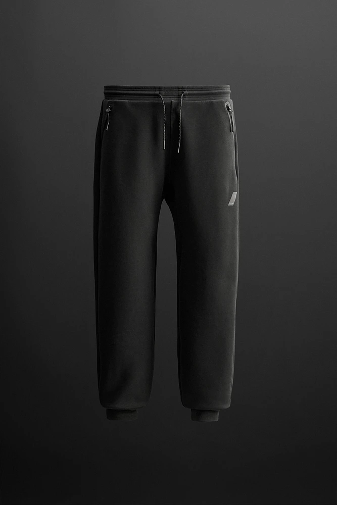 TECHNICAL ZIPPER JOGGER PANTS