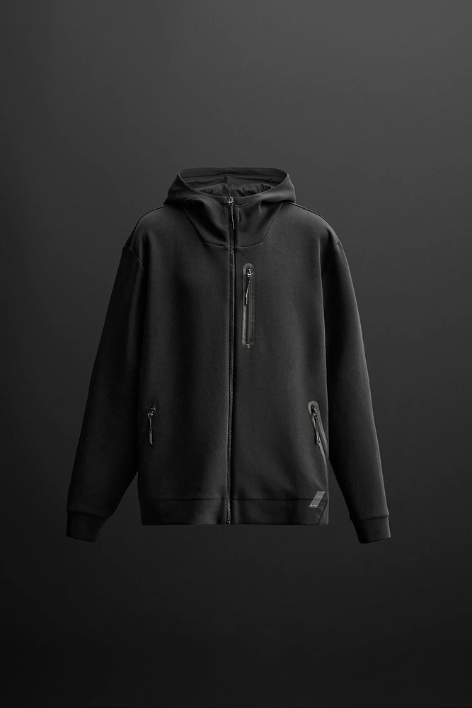 TECHNICAL ZIP SWEATSHIRT