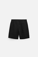 LONGLINE SWIMMING TRUNKS