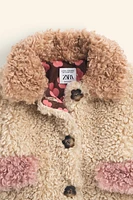 FLOWER BUTTON FAUX SHEARLING COAT LIMITED EDITION