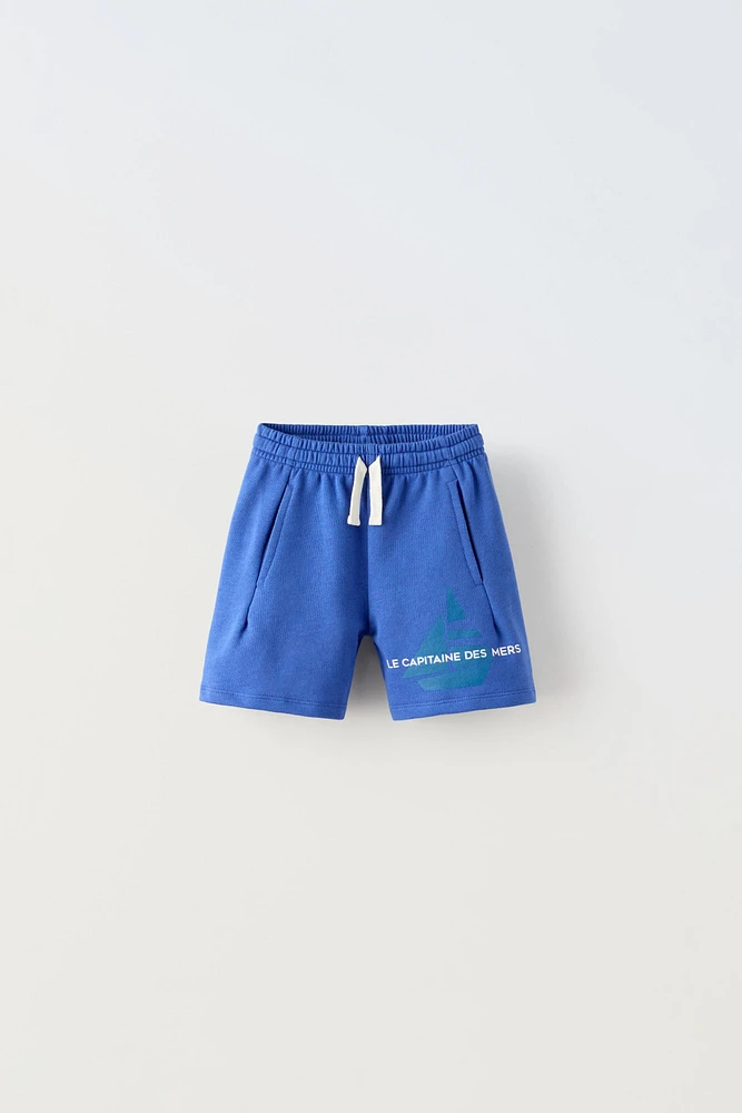 TEXT BOAT SHORTS