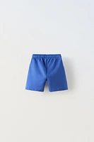 TEXT BOAT SHORTS