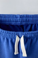 TEXT BOAT SHORTS