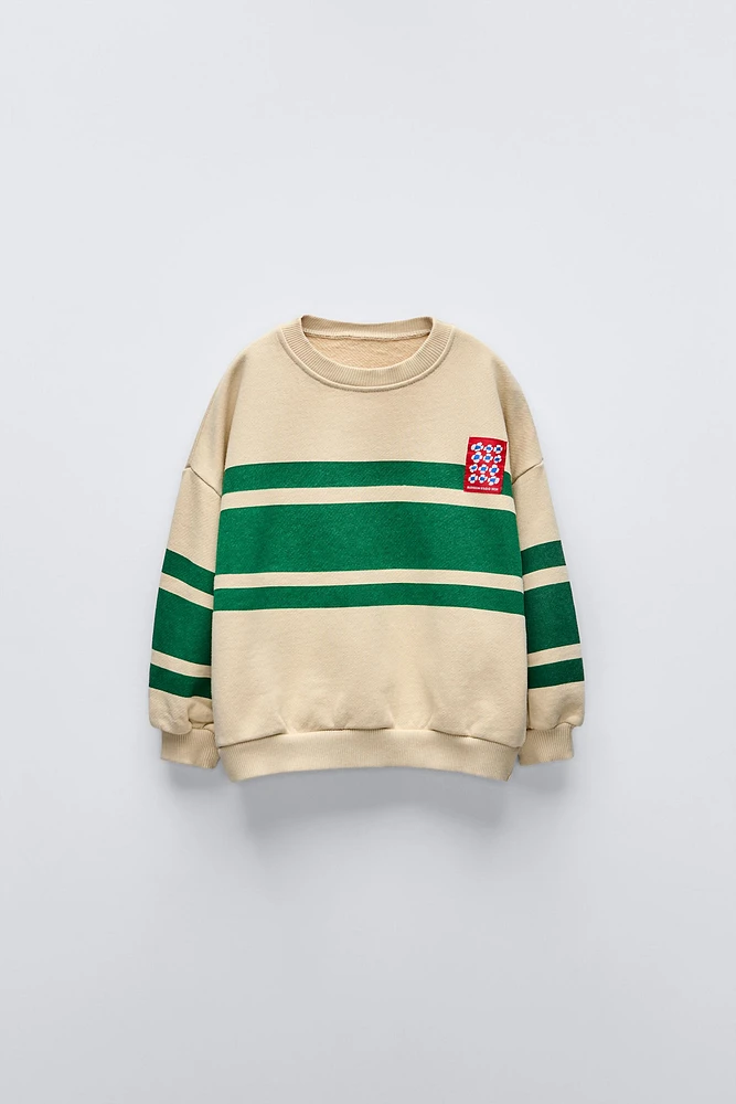 LABEL TRIM STRIPED SWEATSHIRT