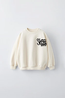 TEXT PRINT FLOCKED SWEATSHIRT