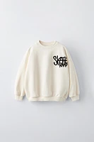 TEXT PRINT FLOCKED SWEATSHIRT