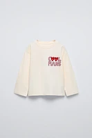 FLOCKED TEXT SHIRT