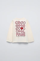 FLOCKED TEXT SHIRT