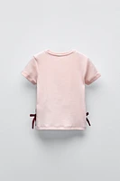 RIBBED T-SHIRT WITH RIBBONS AND BOWS