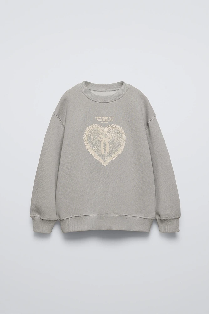 RAISED HEART SWEATSHIRT