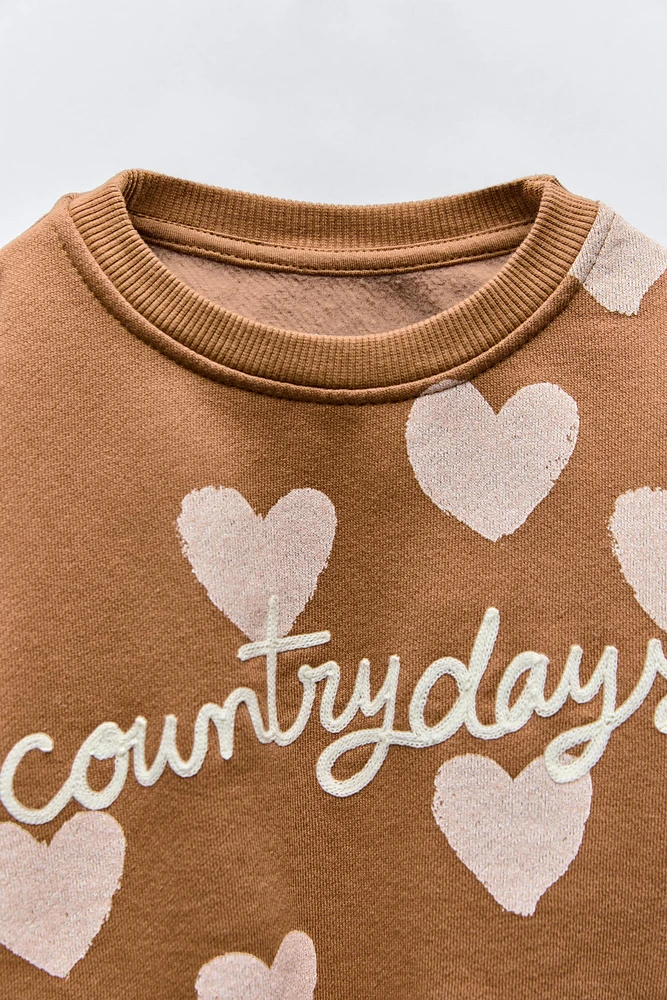 EMBROIDERED HEARTS SWEATSHIRT