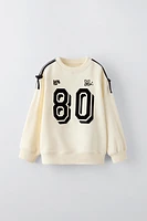 TEXT PRINT FLOCKED SWEATSHIRT