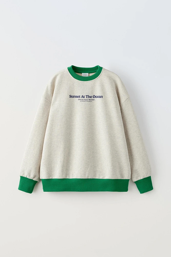 TEXT PRINT SWEATSHIRT WITH PIPING