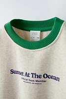 TEXT PRINT SWEATSHIRT WITH PIPING