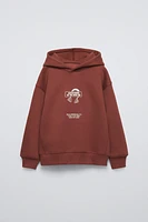 RAISED DETAIL SWEATSHIRT