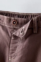 PLEATED PANTS WITH TOPSTITCHING