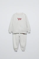 FLOCKED TEXT SWEATSHIRT AND PANTS JOGGING SET