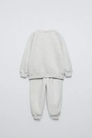 FLOCKED TEXT SWEATSHIRT AND PANTS JOGGING SET