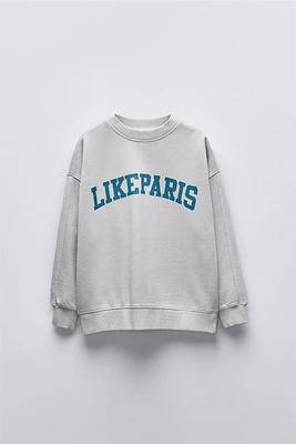 CRACKLED TEXT SWEATSHIRT