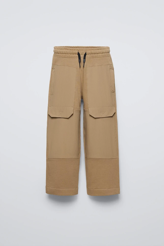 COMBINATION NYLON PANTS