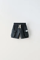 LABEL CARGO SHORTS