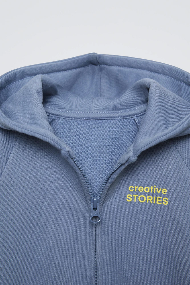 TEXT PRINT HOODED SWEATSHIRT