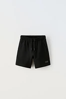 PIQUÉ STRETCH SHORTS