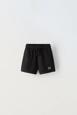 LABEL TRIM PLUSH SHORTS