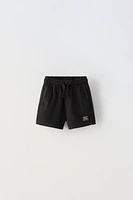 LABEL TRIM PLUSH SHORTS