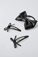 PACK OF HAIR TIES AND FAUX LEATHER BOW CLIPS