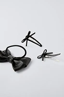 PACK OF HAIR TIES AND FAUX LEATHER BOW CLIPS