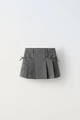 BOX PLEAT BOW SKIRT