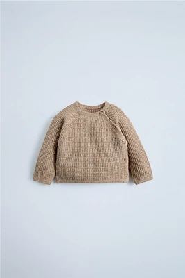 TEXTURED KNIT SWEATER