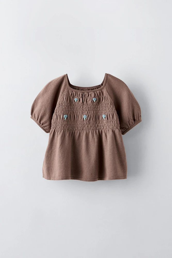 EMBROIDERED SMOCKED KNIT TOP