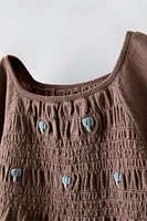 EMBROIDERED SMOCKED KNIT TOP