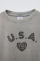 ANIMAL PRINT PATCH T-SHIRT