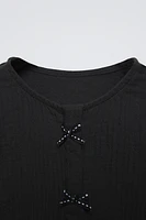 TEXTURED BOW SHIRT