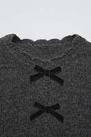 KNIT CARDIGAN WITH BOWS