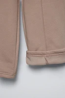 Elastic waistband pants. Adjustable Front drawstring. raised seam detail. Warm and soft interior.