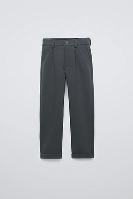 STRETCH SLIM FIT PIQUÉ CHINO PANTS