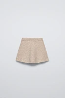 knit skirt with elastic waistband. Cable sides.