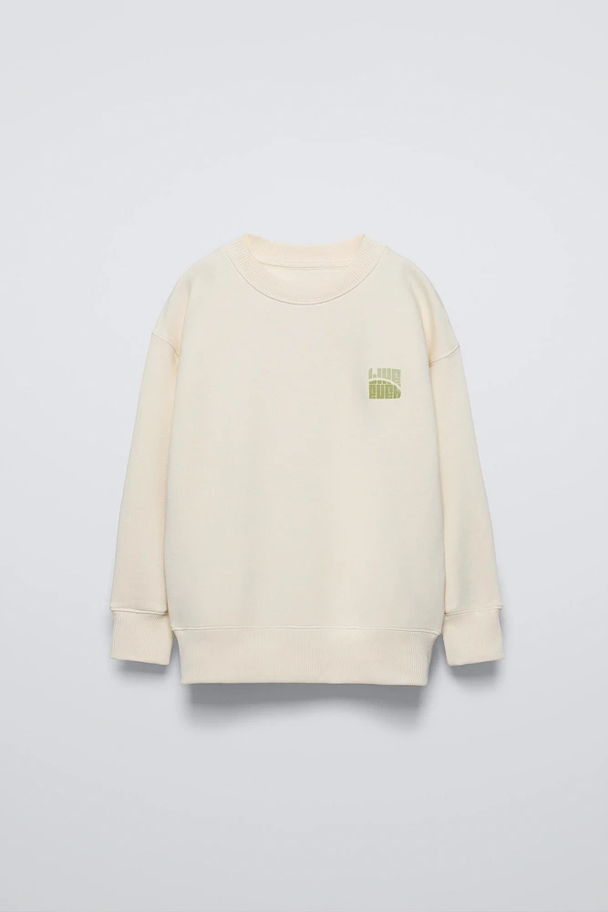 TEXT PRINT FLOCKED SWEATSHIRT