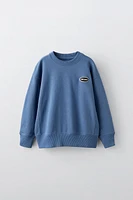 EMBROIDERED PATCH SWEATSHIRT