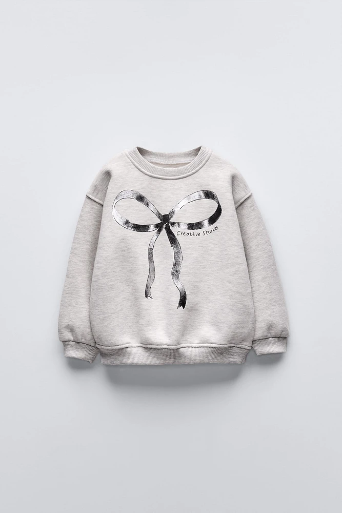 METALLIC BOW SWEATSHIRT